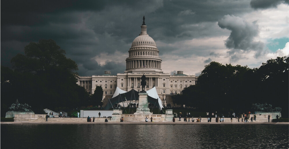 A darkly clouded view of the US Capitol building